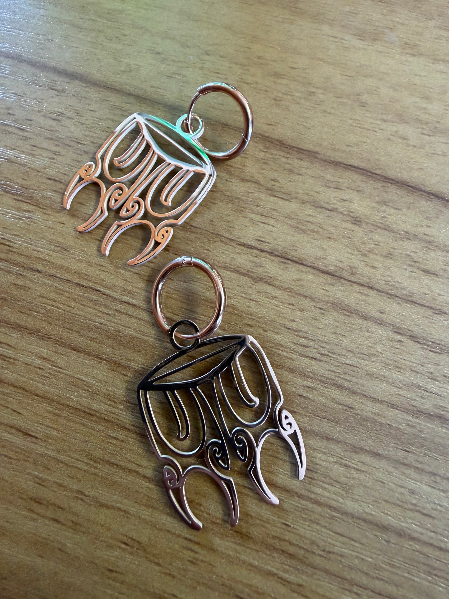 Rose gold huggie kauae earrings