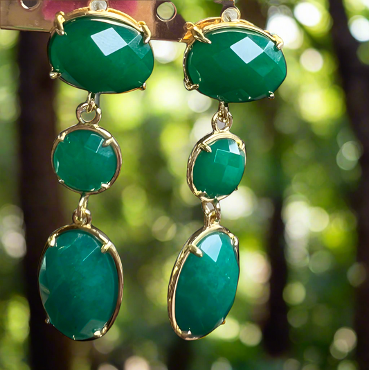 Gold plated setting faceted jade earrings.