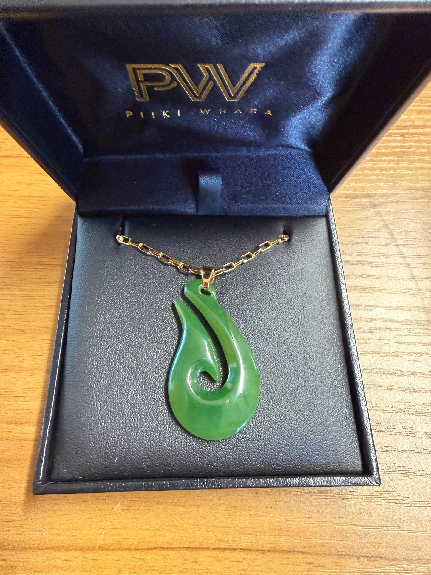 Pounamu hook on 9ct chain