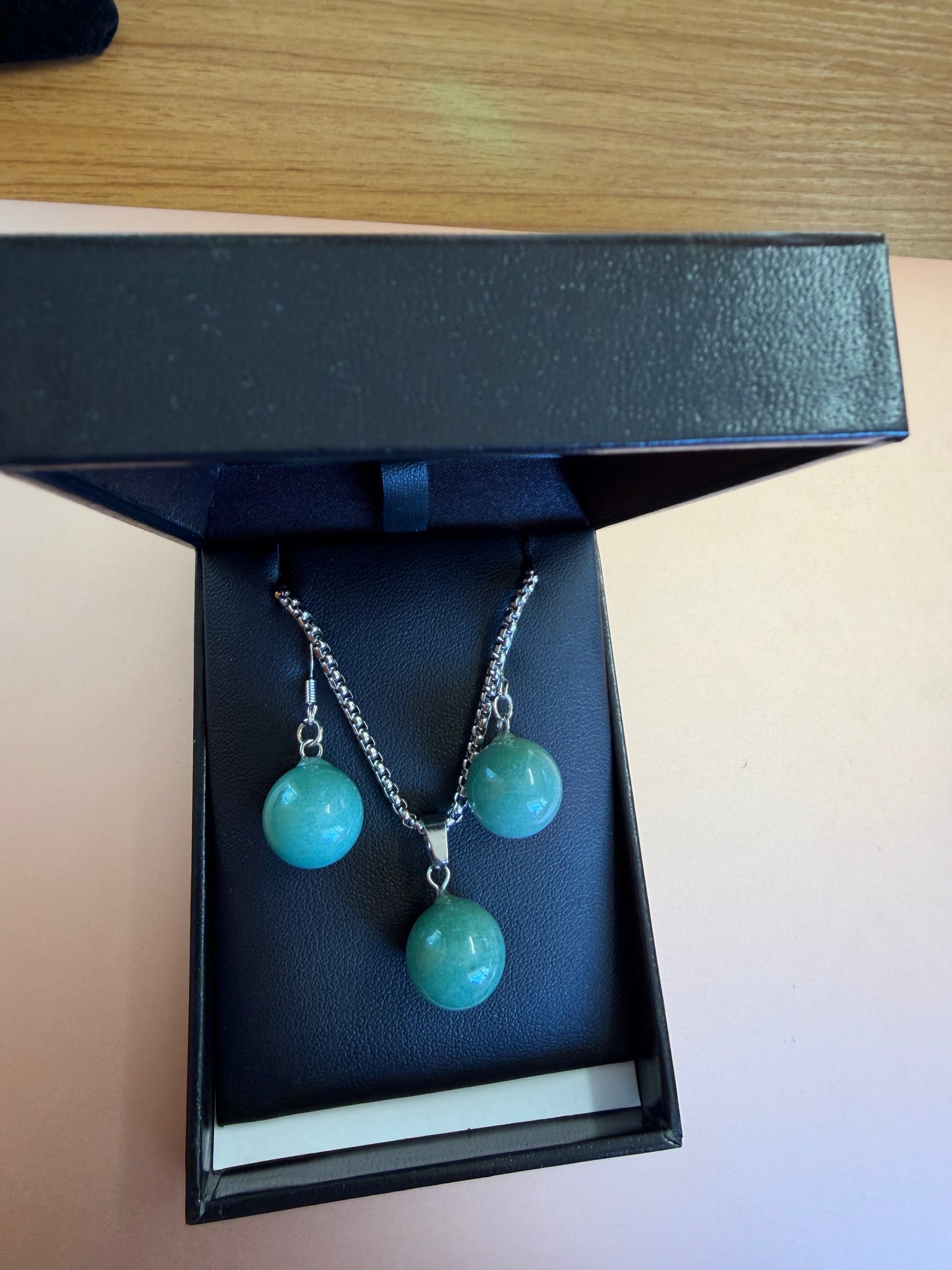 Īnanga pounamu pearl set on Stirling silver.